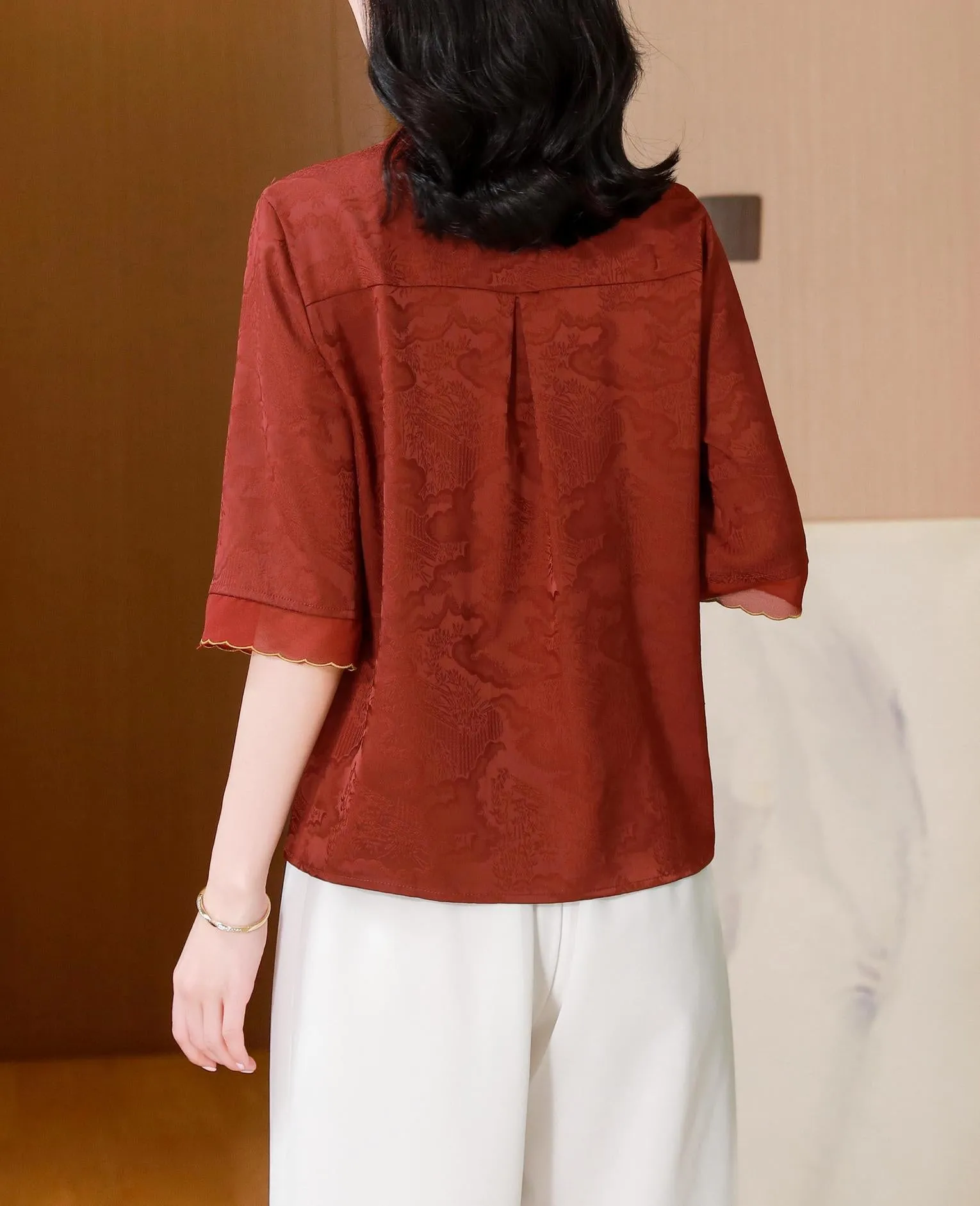 Loose-Fit Blouse Featuring Wrap Neckline and Five-Quarter Sleeves