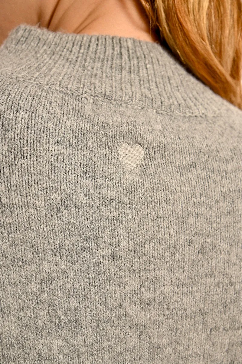 OVERSIZED AND ASYMMETRICAL SWEATER