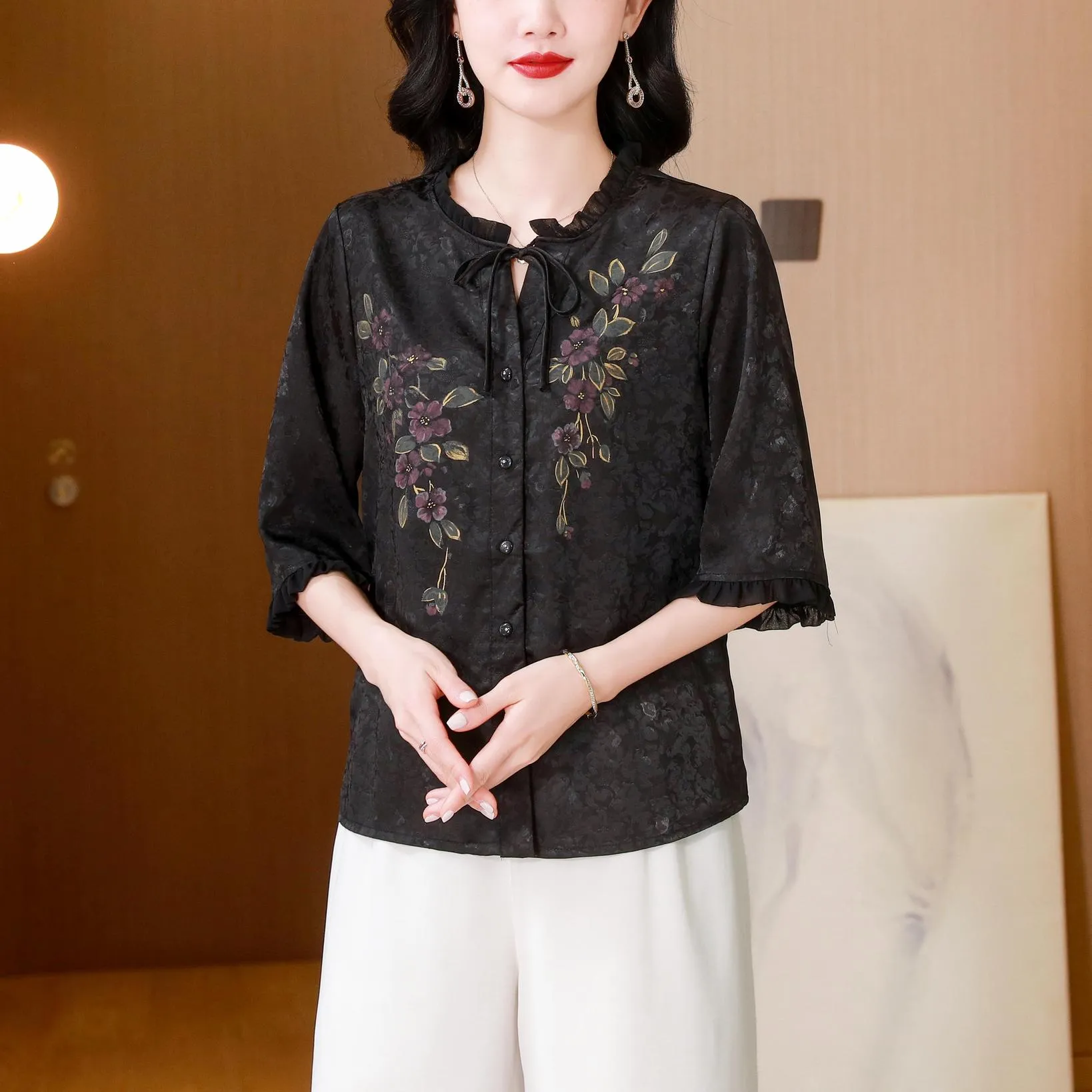 Stylish Loose-fit Blouse Featuring Embroidered and Ruched Sleeves
