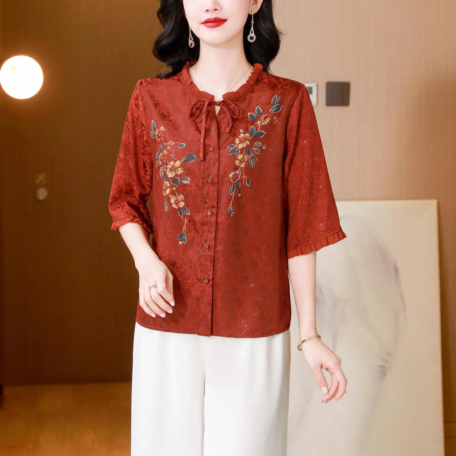 Stylish Loose-fit Blouse Featuring Embroidered and Ruched Sleeves