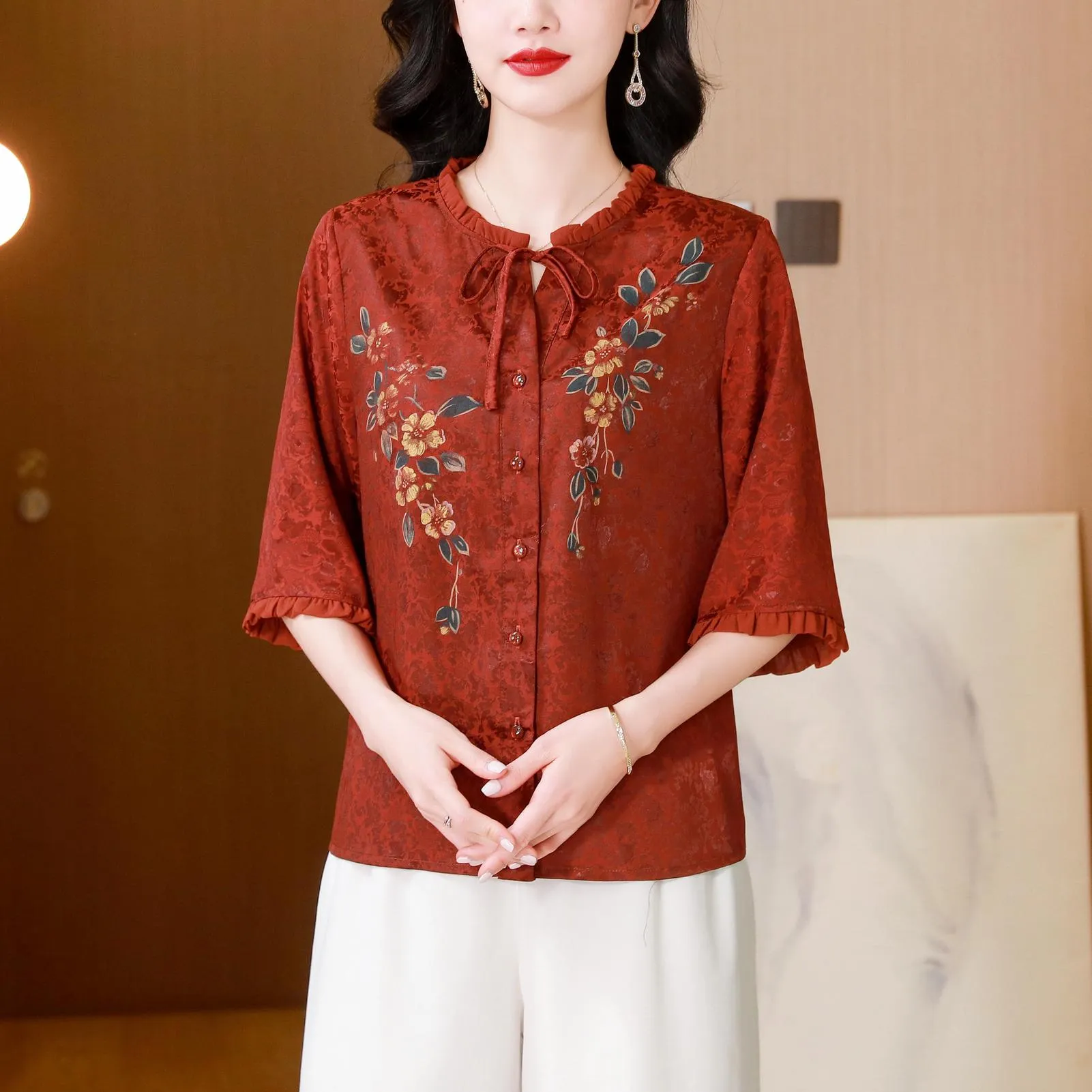 Stylish Loose-fit Blouse Featuring Embroidered and Ruched Sleeves