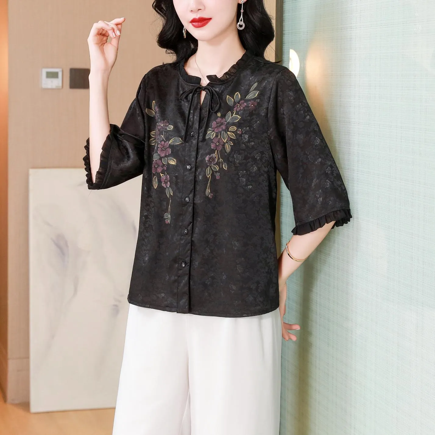 Stylish Loose-fit Blouse Featuring Embroidered and Ruched Sleeves