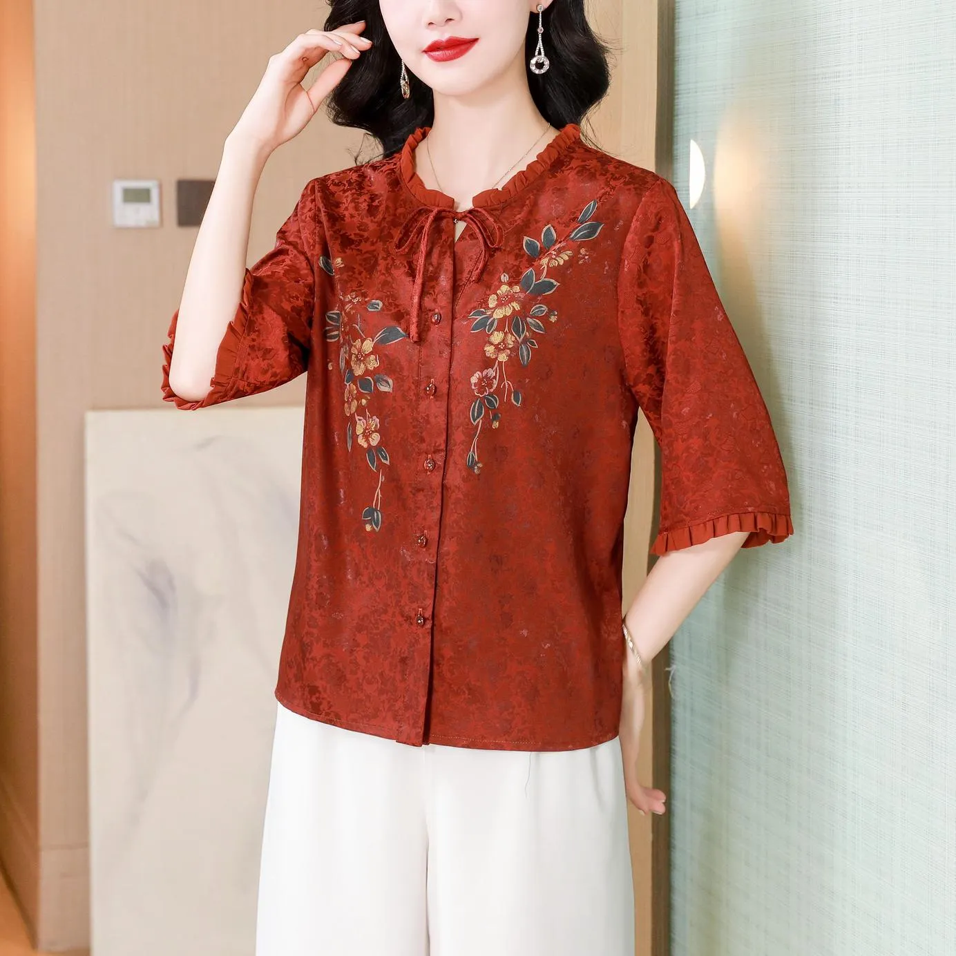 Stylish Loose-fit Blouse Featuring Embroidered and Ruched Sleeves