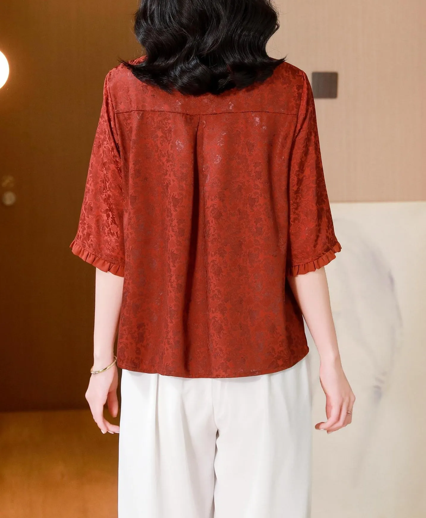 Stylish Loose-fit Blouse Featuring Embroidered and Ruched Sleeves