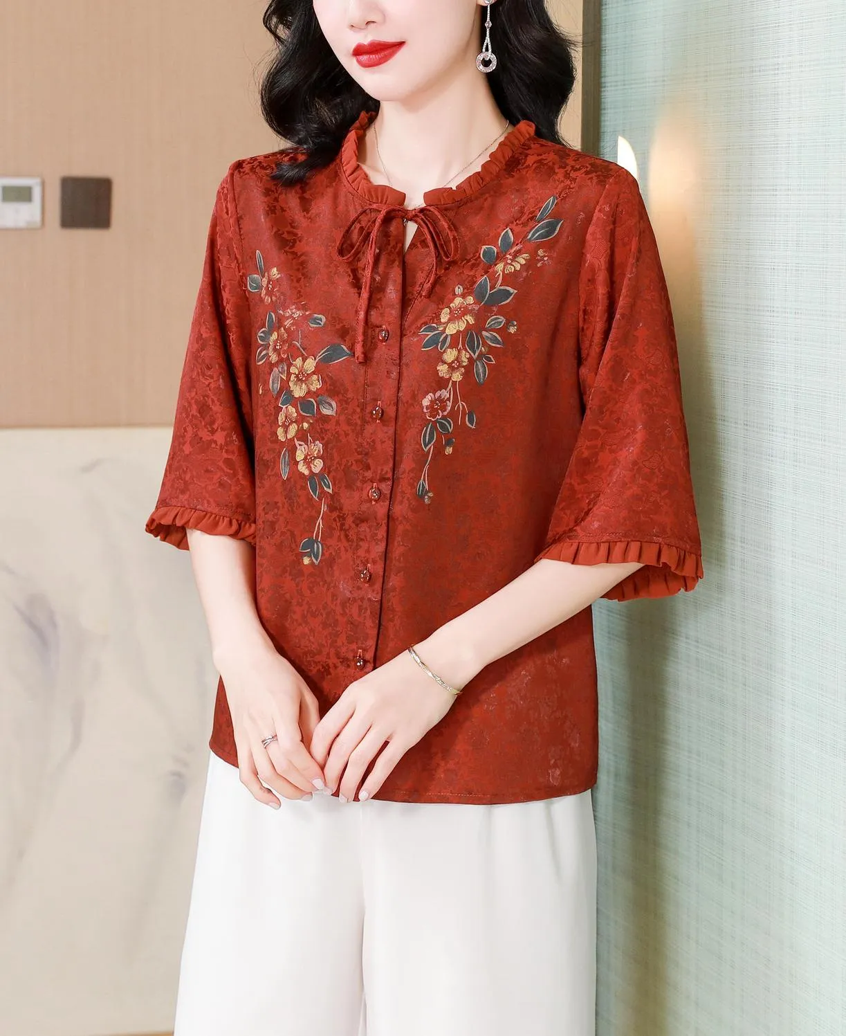 Stylish Loose-fit Blouse Featuring Embroidered and Ruched Sleeves