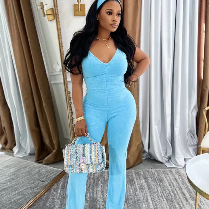Washed V-neck denim jumpsuit with suspenders