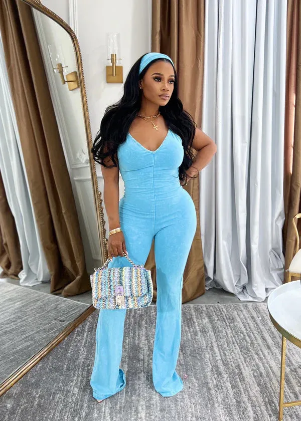 Washed V-neck denim jumpsuit with suspenders